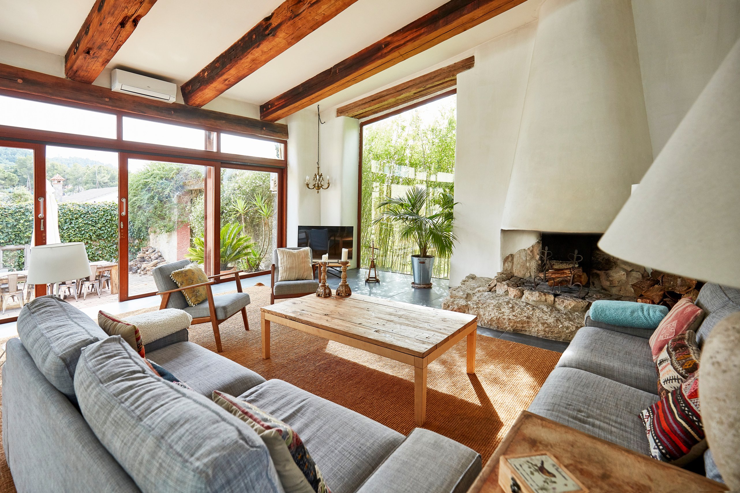 Cozy fireplace in a Mediterranean farmhouse living room